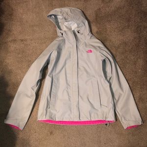 Gray and pink north face rain coat